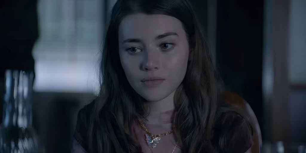 sydney taylor s shaw looking upset at a table in marked men rule shaw
